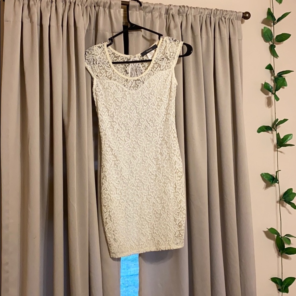 White/cream dress with open back